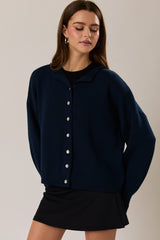 SUETER DE PUNTO NAVY CON BOTONES PERLA