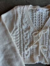 SUETER BEIGE TEJIDO CON MOÑO