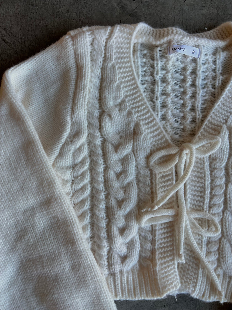 SUETER BEIGE TEJIDO CON MOÑO