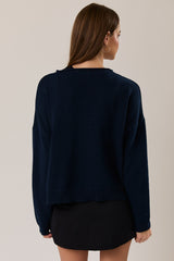 SUETER DE PUNTO NAVY CON BOTONES PERLA