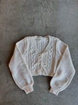 SUETER BEIGE TEJIDO CON MOÑO