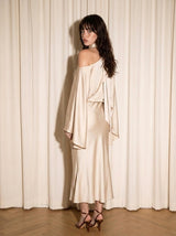 VESTIDO SATIN CON CAÍDA EN EL HOMBRO